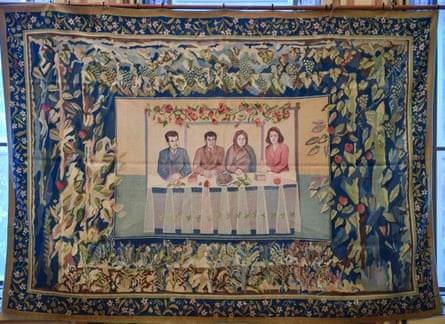 A tapestry from the Ceaușescu era put up for auction in 2018 showing Nicolae Ceaușescu, left, with Elena, right, and his parents. The reputation of the couple has softened among some Romanians in recent years.