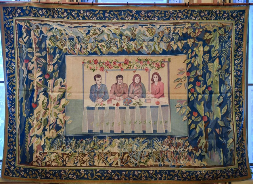 A tapestry from the Ceaușescu era put up for auction in 2018 showing Nicolae Ceaușescu, left, with Elena, right, and his parents. The reputation of the couple has softened among some Romanians in recent years.