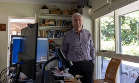 Pearman at home next to his computer