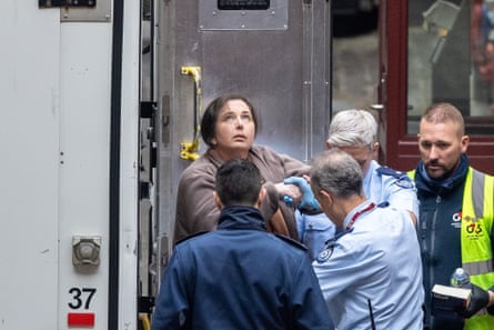 Erin Patterson (left) arrives for a plea hearing at the Victorian supreme court on 25 August.