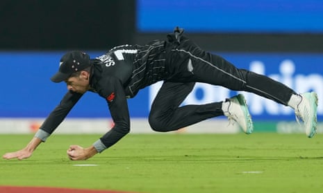 What a catch: New Zealand's Mitch Santner takes a catch to dismiss Afghanistan's captain Hashimatullah Shahidi.