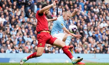 Erling Haaland scores Manchester City’s fourth goal against Wolves.