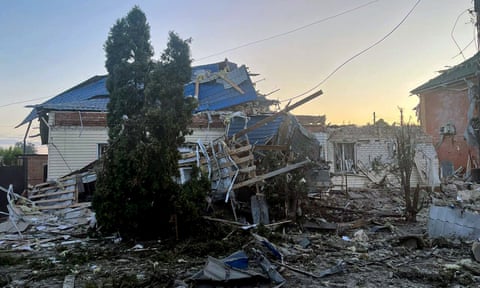 Damaged homes in the town of Sudzha