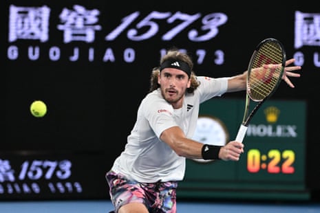 Greece's Stefanos Tsitsipas hits a return against Czech Republic's Jiri Lehecka.