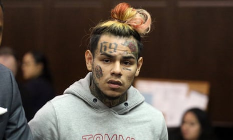 Tekashi 6ix9ine appears at an arraignment in New York in July.