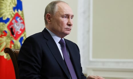 Russia's president Vladimir Putin chairs a meeting with members of the government via videoconference yesterday.