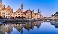 Leie river bank in Ghent, Belgium, Europe.<br>Picturesque medieval buildings overlooking the “Graslei harbor” on Leie river in Ghent town, Belgium, Europe.