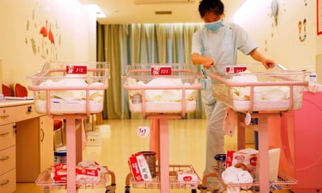 A nurse taking care of newborn babies in Shanghai