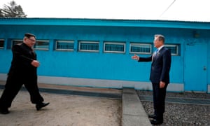 North Korea’s leader Kim Jong-un crosses the border between to shake hands with South Korea’s President Moon Jae-in