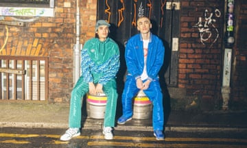 Two models wearing sportswear from Umbro's centenary collection