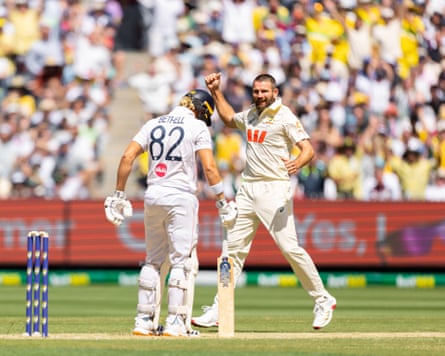 Michael Neser celebrates after dismissing Jacob Bethell on day one of the fourth Ashes Test