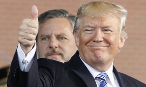 Donald Trump gives a thumbs up.