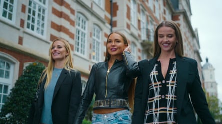 Three glamorous-looking female estate agents.