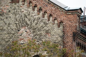 Signs of mortar shelling on a wall of the former Friedrichsruhe brewery