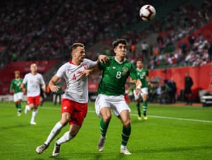 Callum O’Dowda of Republic of Ireland in action against Tomasz Kdziora of Poland.