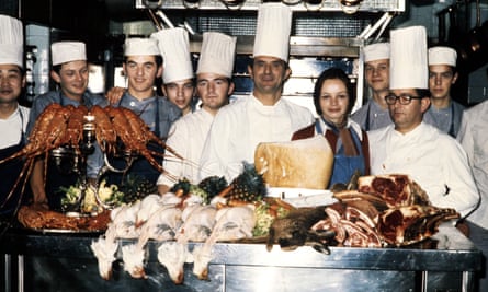 Paul Bocuse, centre, in his restaurant kitchen in 1973; two years later he was made a chevalier of the Légion d’honneur.