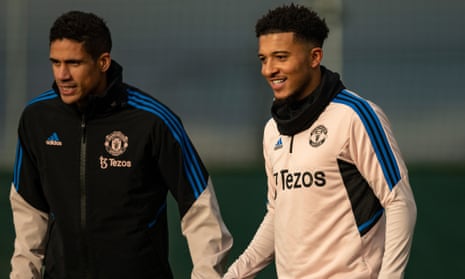 Jadon Sancho (right) trains alongside Raphaël Varane