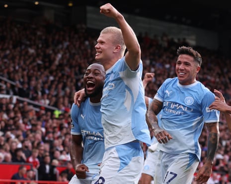Erling Haaland celebrates after his goal for Manchester City at Manchester United was awarded after a VAR check