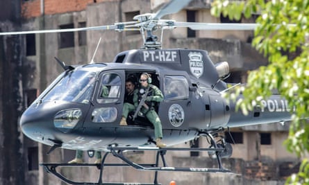 Marcelo Pinheiro, AKA ‘Piloto’, is transferred by helicopter from the city of Foz do Iguacu, on their way to Catanduvas maximum-security federal penitentiary in Paraná state, Brazil, on Monday.