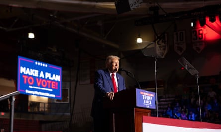 Donald Trump speaks to supporters during a campaign event in Saginaw, Michigan.