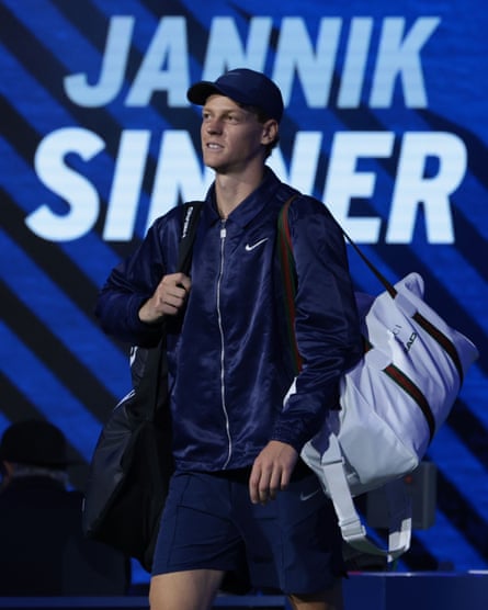 Jannik Sinner walks on the court before his US Open quarter-final