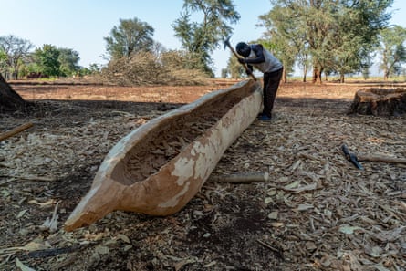 White Lagwani, 60, a fisherman and canoe maker, at work on Chisi Island, Malawi