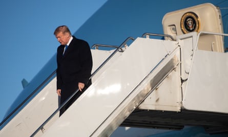 Donald Trump disembarks from Air Force One