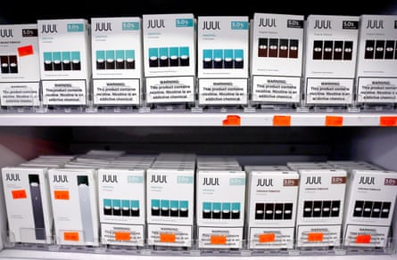Juul e-cigarettes are displayed for sale.