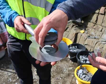 Officials check the stones used are made of Easdale slate and are no wider than 7.6 cm.