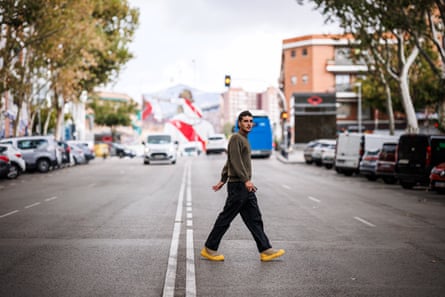 Sergio Camello crosses the road by the Rayo Vallecano stadium
