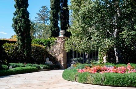 a gate surrounded by trees