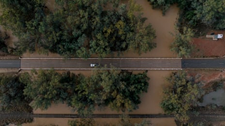 The road and into Quilpie 1000kms west of Brisbane, surrounded by flood waters.