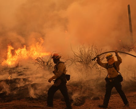 Firefighters battle the Canyon fire in Hasley Canyon, California, on Thursday.
