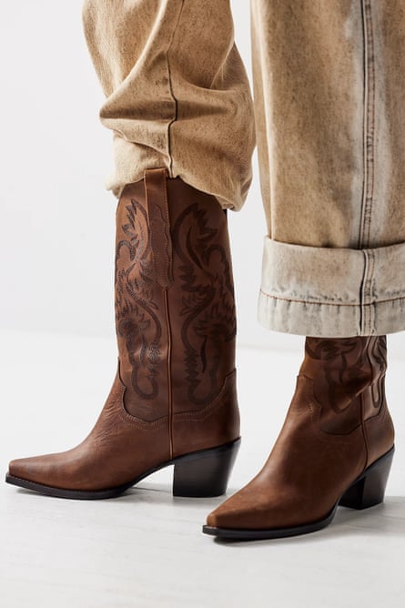 A model wearing Jeffrey Campbell Daggett Western Boots