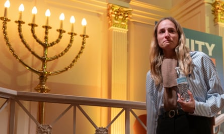 A survivor of Hamas’s attack on the Supernova music festival, Noa Ben Artzi, walks from the stage, during a gathering of the American Jewish Community in Washington’s Sixth & I Historic Synagogue on 17 October 2023.