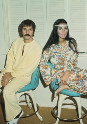 With ex-husband Sonny Bono in a 70s jumpsuit and headband look.