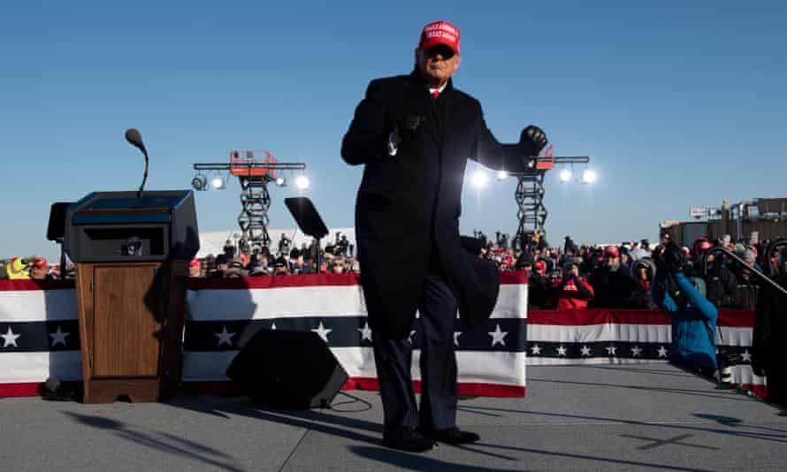 Trump at a pre-election rally in Dubuque, Iowa in November last year. A Des Moines Register poll showed 53% of Iowans view Trump favourably.