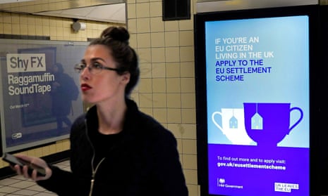 A government advertisement at South Kensington station in London encouraging EU nationals to apply to the EU settlement scheme.