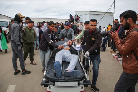 People transport a Palestinian who was released from an Israeli jail, in Khan Younis in the southern Gaza Strip.