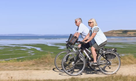A couple riding electric bicycles