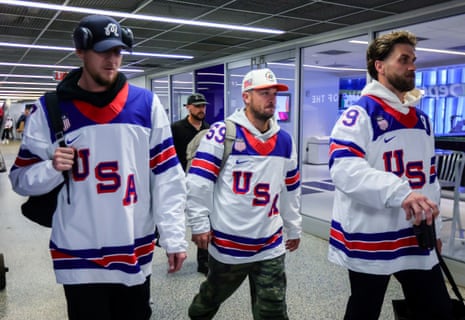 Bryce Harper, right, and other members of Team USA arrive.
