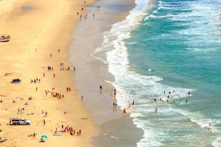 Aerial view of oeople on the beach at Burleigh Heads on the Gold Coast of Queensland, Australia