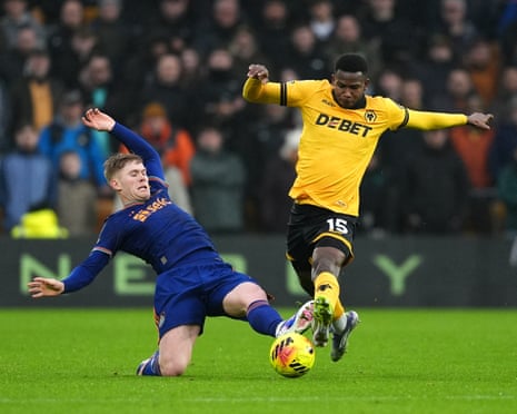 Lewis Hall and Yerson Mosquera battle for the ball.