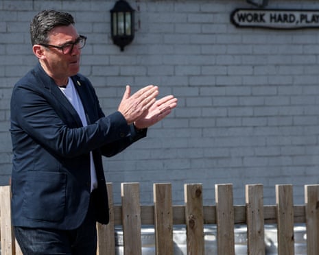 Andy Burnham applauding someone out of frame