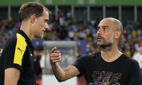 Pep Guardiola (right) and Thomas Tuchel in conversation in 2016 before Manchester City played Borussia Dortmund in China.