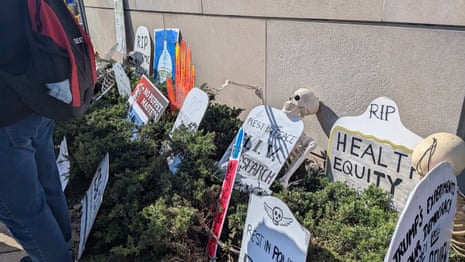 People gathered at the National Institutes of Health to protest against the Trump administration’s cuts to scientific research.