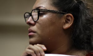 A woman cries as she listens during an event to protest Trump’s decision to revoke the Deferred Action for Childhood Arrivals program, known as Daca.