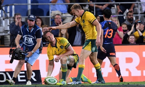 Dane Haylett-Petty of the Wallabies (left) is congratulated by team mate Reece Hodge of the after scoring a try.