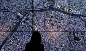 People look at a Google Earth map of Paris,France on a screen as Google Earth unveils the revamped version of the application April 18, 2017 at a event at New York's Whitney Museum of Art.
Google on Tuesday launched a re-imagined version of its free Earth mapping service, weaving in storytelling and artificial intelligence and freeing it from apps. / AFP PHOTO / TIMOTHY A. CLARYTIMOTHY A. CLARY/AFP/Getty Images