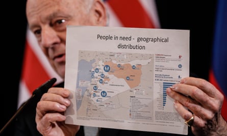Steffan de Mistura, the UN secretary general’s special envoy, holds up a map showing people in need in Syria.